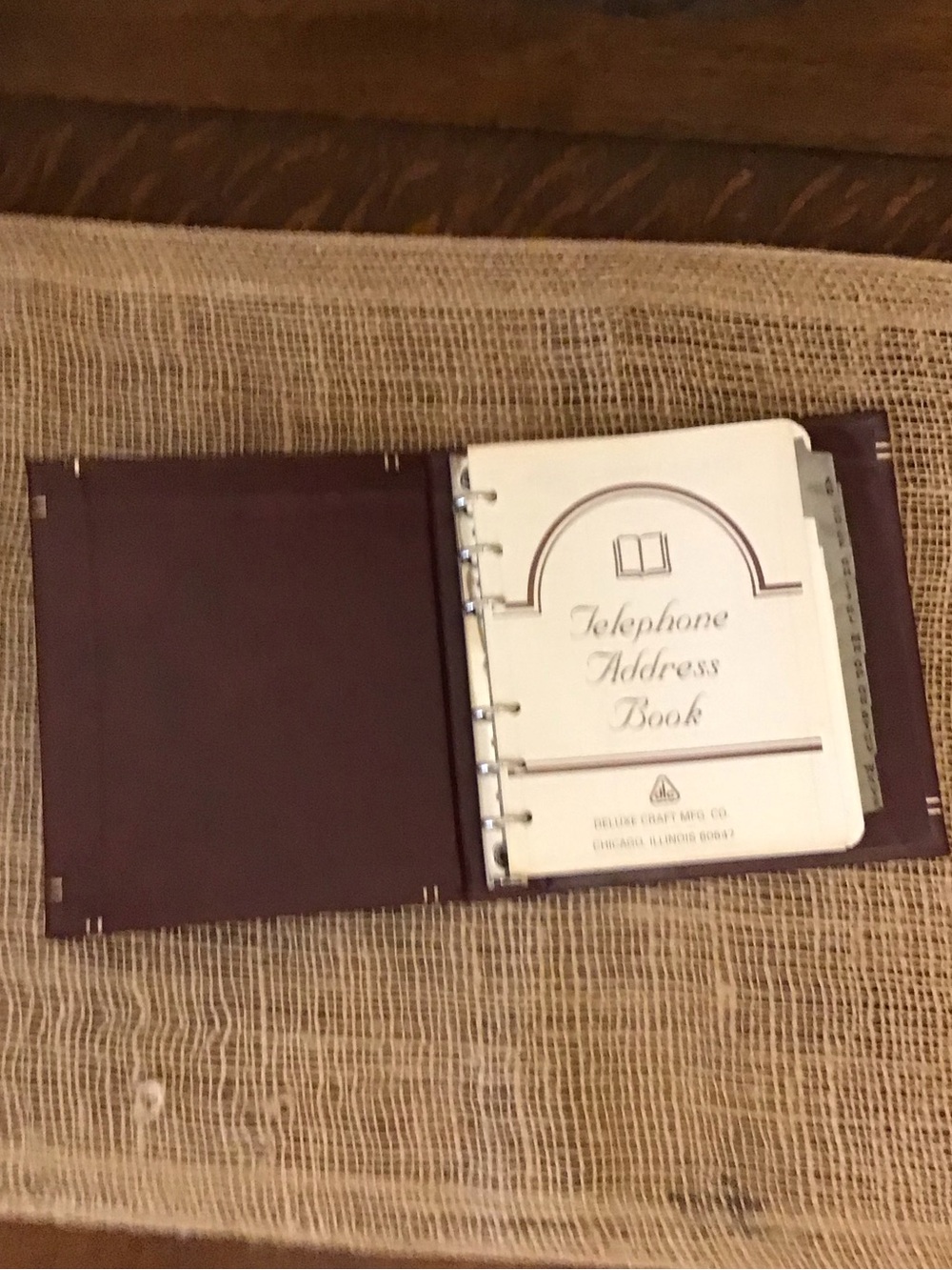 Vintage 6-ring burgundy leather or faux leather address book